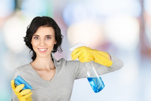 Technician using hot water extraction for carpet cleaning in Kensal Green