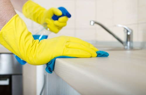 Carpet cleaning team applying safety procedures before work begins